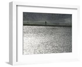 A Man Stands on the Banks of a Small Lake, Munich, on Friday, November 3, 2006.-Christof Stache-Framed Photographic Print