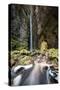 A Man Stands under Cachoeira Fumacinha Waterfall in Chapada Diamantina National Park-Alex Saberi-Stretched Canvas