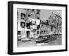 A Man Takes His Boat Through the Canal-null-Framed Photographic Print