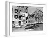 A Man Takes His Boat Through the Canal-null-Framed Photographic Print