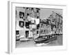 A Man Takes His Boat Through the Canal-null-Framed Photographic Print