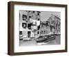 A Man Takes His Boat Through the Canal-null-Framed Photographic Print