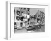 A Man Takes His Boat Through the Canal-null-Framed Photographic Print