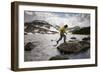 A Man Uses His Trekking Poles to Hop across a Lake in the Southern Wind River Range in Wyoming-Sergio Ballivian-Framed Photographic Print