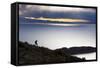 A Man Walks Along a Rocky Crest Above Lake Titicaca in Bolivia During Sunset-Sergio Ballivian-Framed Stretched Canvas