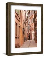 A Man Walks Through La Petite France-Julian Elliott-Framed Photographic Print