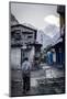 A Man Walks Through Tatopani-Andrew Taylor-Mounted Photographic Print