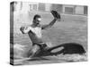 A Man with a Cowboy Hat Rides a Killer Whale-null-Stretched Canvas