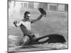 A Man with a Cowboy Hat Rides a Killer Whale-null-Mounted Photographic Print