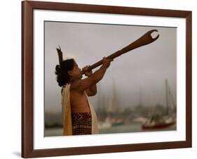 A Maori Warrior Calls Across Auckland-null-Framed Photographic Print