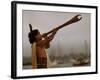 A Maori Warrior Calls Across Auckland-null-Framed Photographic Print