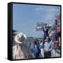 A Mechanic Holding Up a Sign, French Grand Prix, Le Mans, France, 1967-null-Framed Stretched Canvas