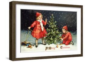 A Merry Christmas with Two Children Decorating Tree-K.J. Historical-Framed Giclee Print