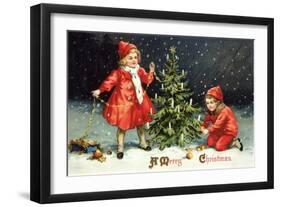 A Merry Christmas with Two Children Decorating Tree-K.J. Historical-Framed Giclee Print