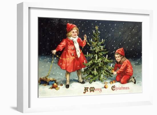 A Merry Christmas with Two Children Decorating Tree-K.J. Historical-Framed Giclee Print