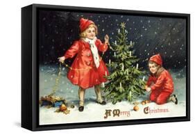 A Merry Christmas with Two Children Decorating Tree-K.J. Historical-Framed Stretched Canvas