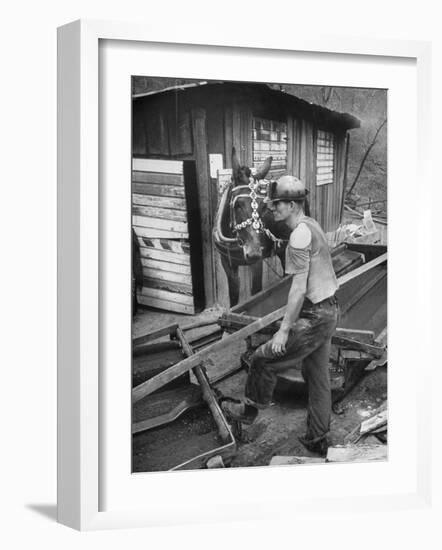 A Miner Standing with a Mule at the Rock House Coal Co. Mine-null-Framed Photographic Print