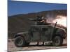 A Missileman Firing a BGM-71 TOW Missile Atop a Humvee-Stocktrek Images-Mounted Photographic Print