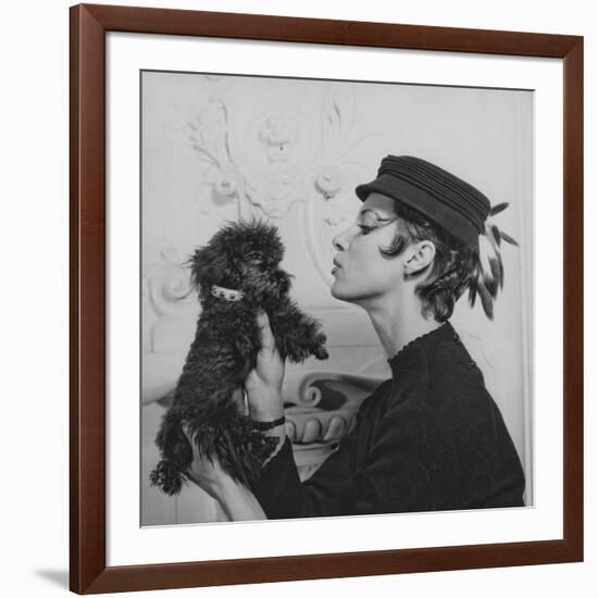 A Model Wearing a Hat Trimmed with Feathers-null-Framed Giclee Print