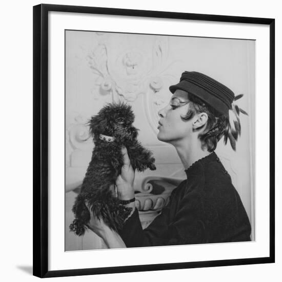 A Model Wearing a Hat Trimmed with Feathers-null-Framed Giclee Print