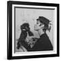 A Model Wearing a Hat Trimmed with Feathers-null-Framed Giclee Print