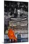 A Monk Prays in Front of a Golden Buddha, Wat Suthat, Bangkok, Thailand, Southeast Asia, Asia-Andrew Taylor-Mounted Photographic Print