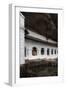 A Monk Sits and Looks at His Phone Beneath Shelter-Charlie-Framed Photographic Print