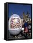 A Moravian Woman Decorating a Large Egg with Easter Designs on the Old Town Square, Prague-Richard Nebesky-Framed Stretched Canvas