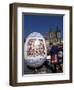 A Moravian Woman Decorating a Large Egg with Easter Designs on the Old Town Square, Prague-Richard Nebesky-Framed Photographic Print