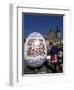 A Moravian Woman Decorating a Large Egg with Easter Designs on the Old Town Square, Prague-Richard Nebesky-Framed Photographic Print