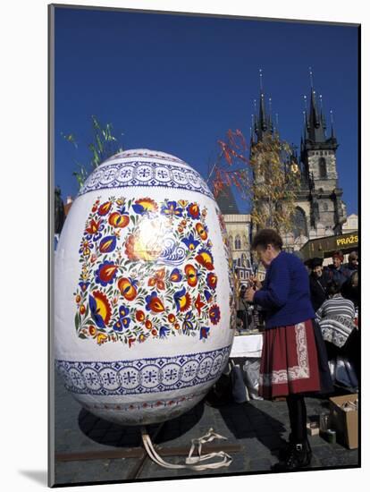 A Moravian Woman Decorating a Large Egg with Easter Designs on the Old Town Square, Prague-Richard Nebesky-Mounted Photographic Print