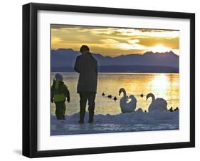 A Mother and Child Feed Water Fowl on the Ice Covered Shores of Lake Chiemsee-null-Framed Photographic Print