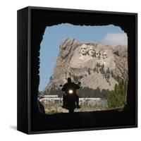 A Motorcyclist Rolls Through a Tunnel on Iron Mountain Road-null-Framed Stretched Canvas