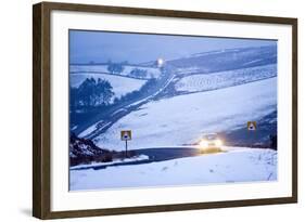 A Motorist Drives Through a Wintry Landscape on the B4520-Graham Lawrence-Framed Photographic Print