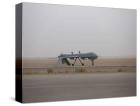 A Mq-1C Warrior Taxis Out to the Runway to for a Mission over Northern Iraq-null-Stretched Canvas