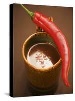 A Mug of Chili Chocolate-Anita Oberhauser-Stretched Canvas