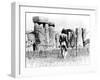 A Naked Hippy Watches Stonehenge from Behind Barb Wire on Summer Solstice-null-Framed Premium Photographic Print