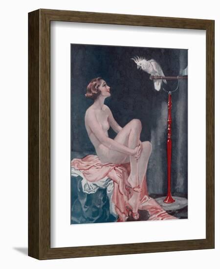 A Naked Woman Relaxing While Speaking to Her Cockatoo-null-Framed Art Print