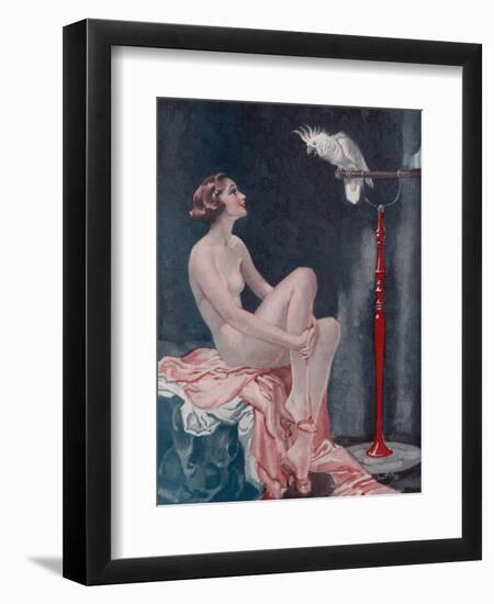 A Naked Woman Relaxing While Speaking to Her Cockatoo-null-Framed Art Print