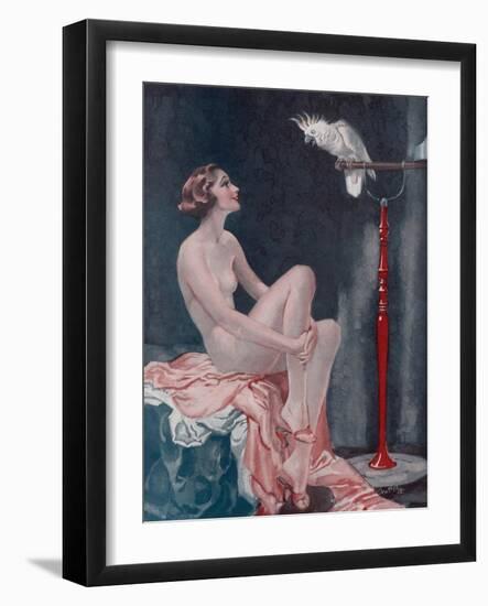 A Naked Woman Relaxing While Speaking to Her Cockatoo-null-Framed Art Print