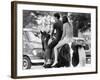 A Naked Young Women and Escort Ride a Horse Through Goose Lake Park at 3 Day Rock Music Festival-null-Framed Photo