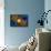 A Nebulous Alien Planetary Star System-null-Framed Art Print displayed on a wall