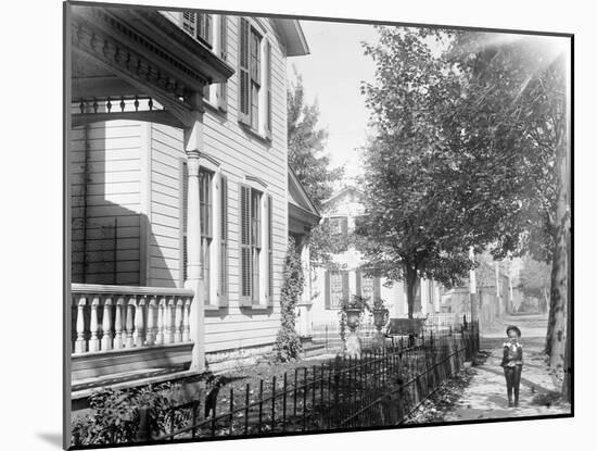 A neighbor, Daniel Henderson, in front of Wright home at 7 Hawthorn Street, Dayton, Ohio, 1897-1901-null-Mounted Photographic Print