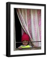 A Nepali Child Looks out from a Window at Pro-Democracy Activists-null-Framed Photographic Print