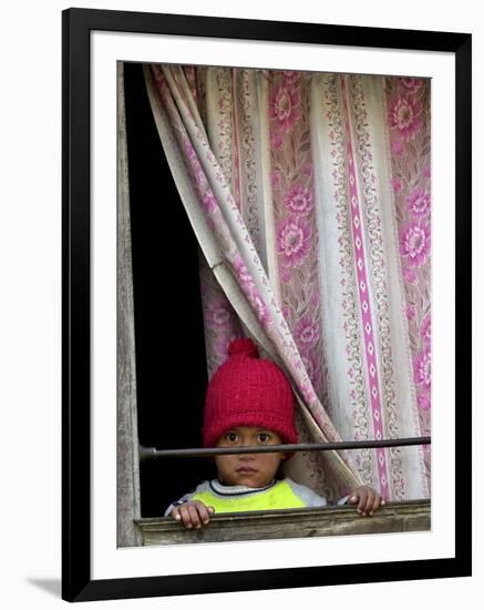 A Nepali Child Looks out from a Window at Pro-Democracy Activists-null-Framed Photographic Print