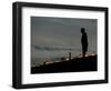 A New Orleans Resident Stands During a Candlelight Ceremony-Carlos Barria-Framed Photographic Print