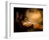 A Novice Monk Lighting Candles at a Massive Buddha Statue in Burma (Myanmar)-Kyle Hammons-Framed Photographic Print