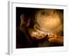 A Novice Monk Lighting Candles at a Massive Buddha Statue in Burma (Myanmar)-Kyle Hammons-Framed Photographic Print