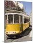 A Number 28 Tram Runs Along the Scenic Route Popular With Tourists in the Alfama District of Lisbon-Stuart Forster-Mounted Photographic Print