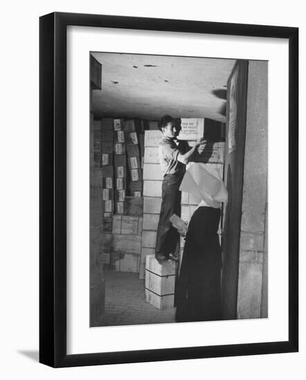 A Nun from the Order of Sisters of Charity and an Assistant Carrying Boxes of Food-null-Framed Photographic Print